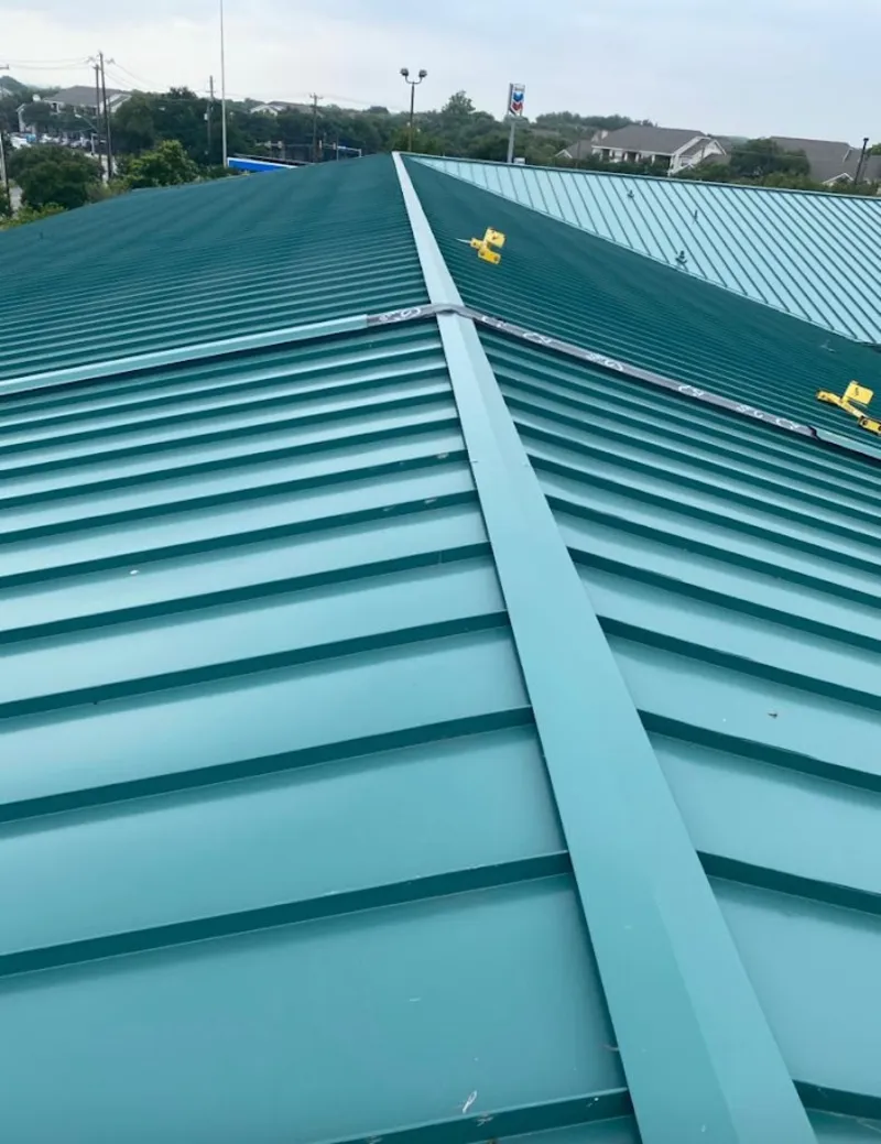 Green commercial metal roof ridge and valley for Metal Roof Repair in Cohasset
