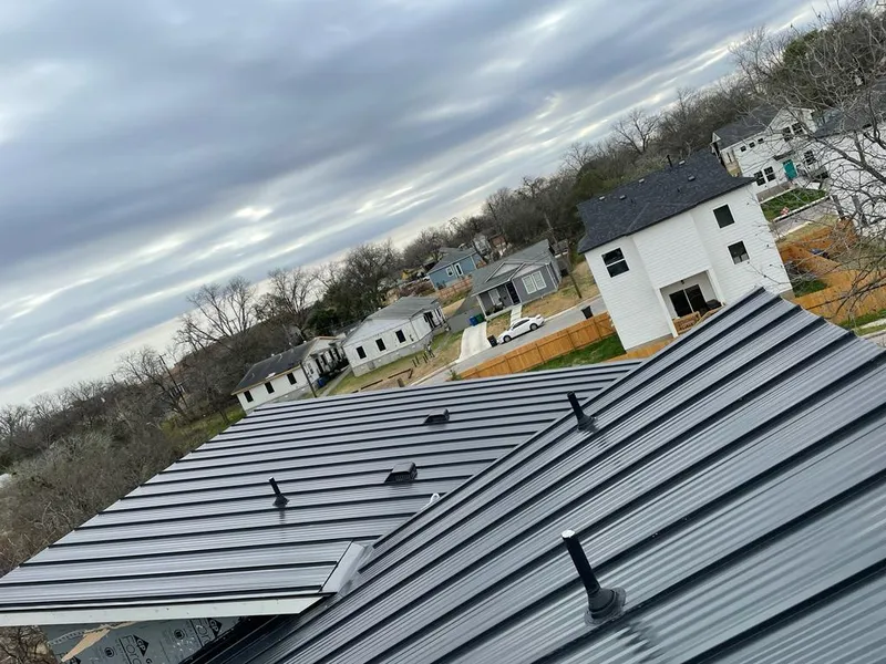 Standing seam metal roof panels with vents for Skylight Repair in Cohasset
